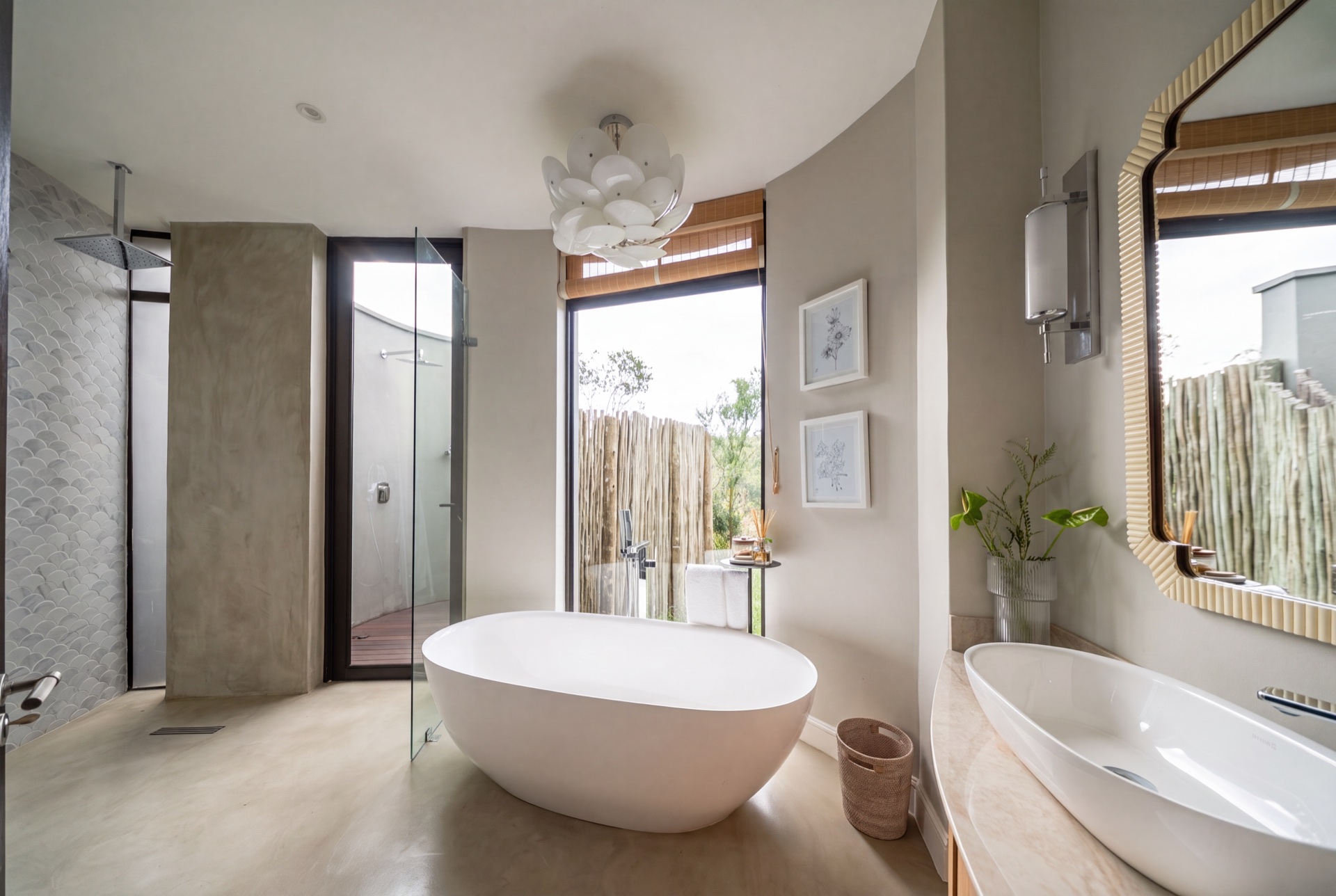 Twin freestanding baths framing the bushveld