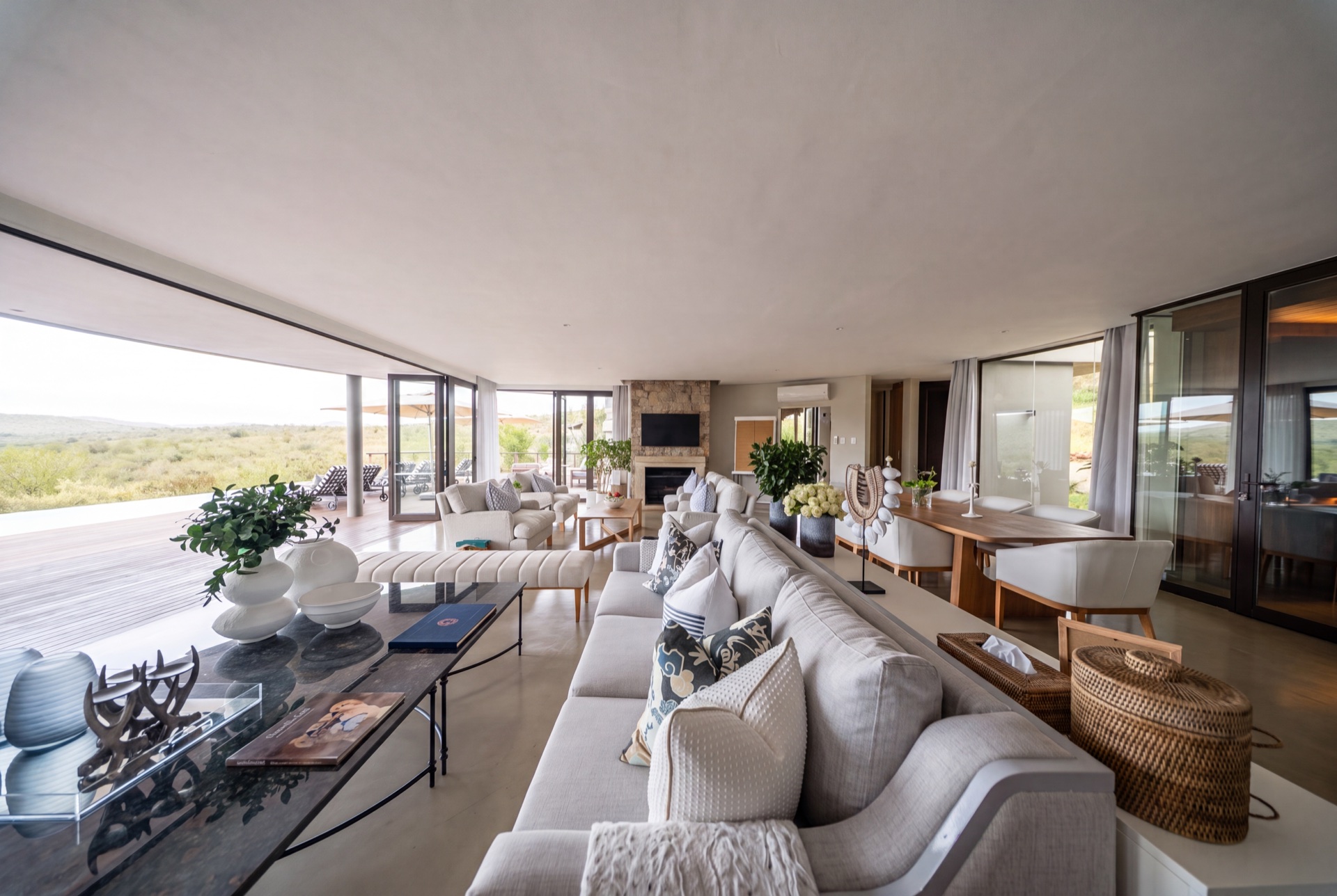 Styled living room opening onto the reserve at Villa Mhlosinga