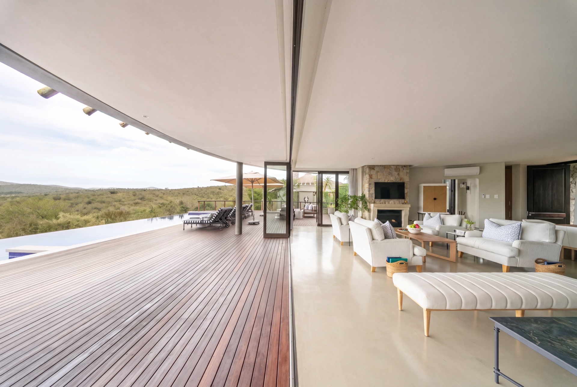 Open living space and deck overlooking the Thanda Safari reserve
